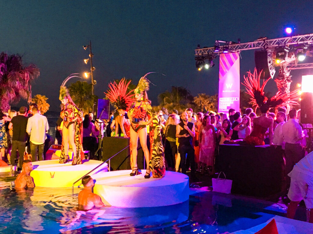 w hotel barcelona outdoor party women in costumes