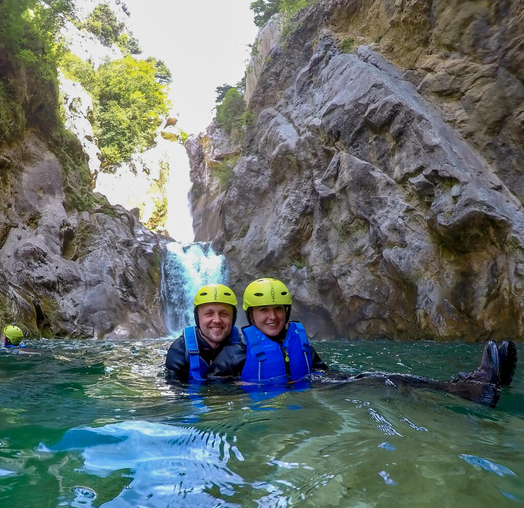 couple canyoning in river cetina in croatia