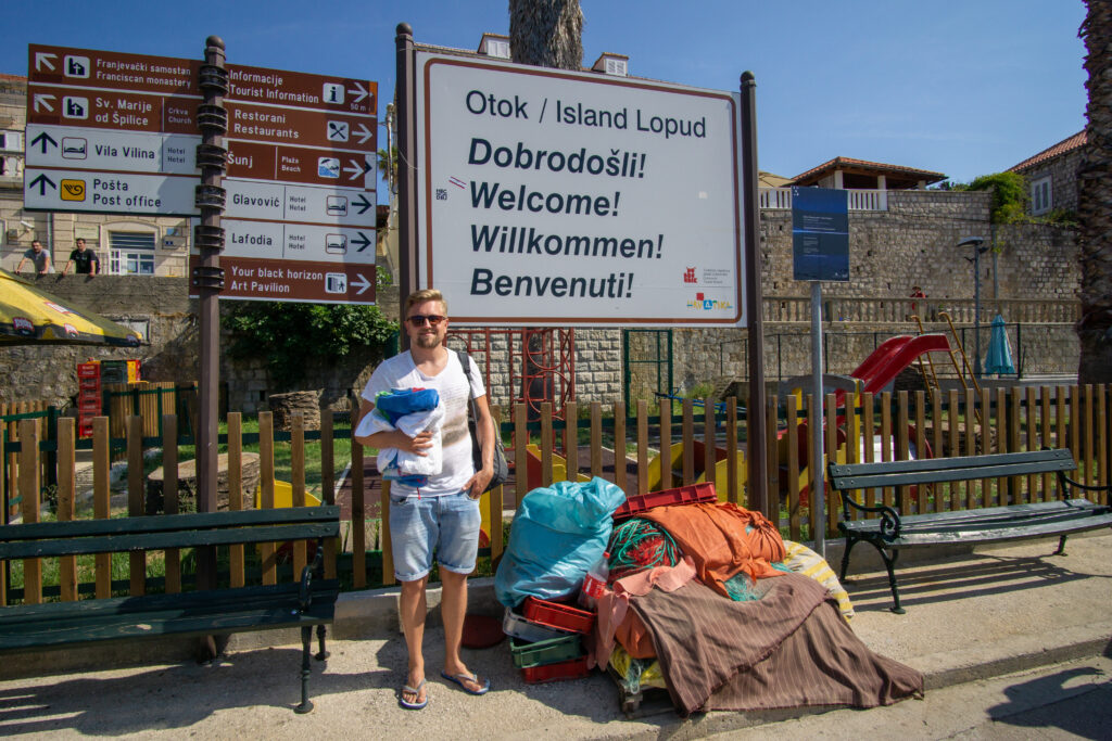 welcome sign in the port of lopud croatia