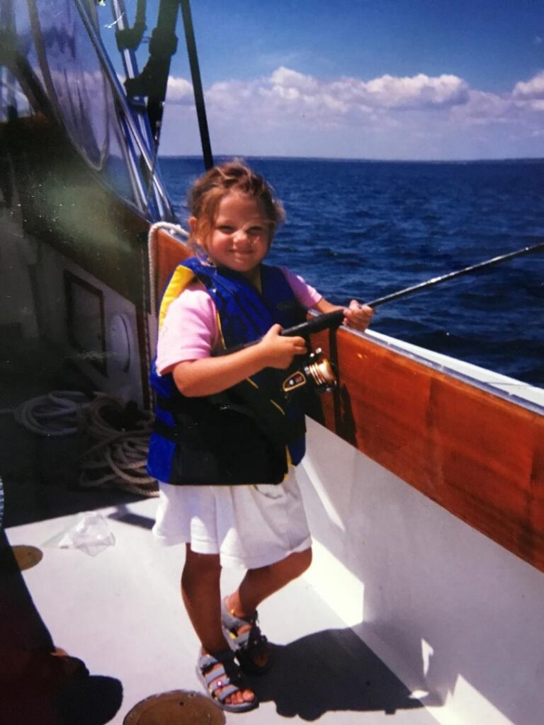 captain coral aiello as a child fishing